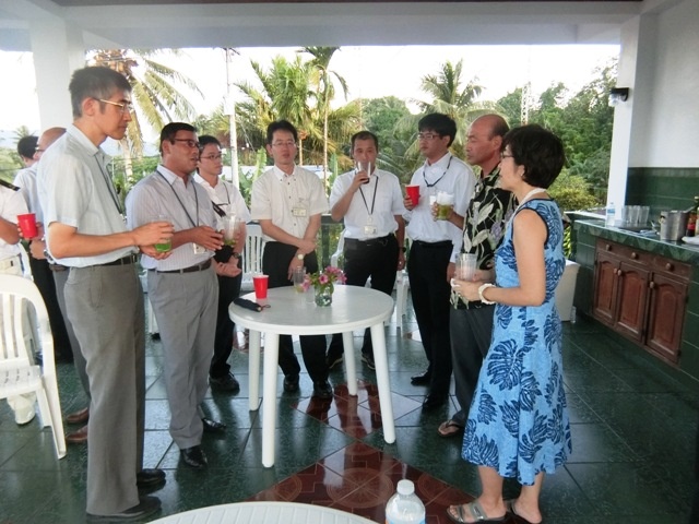 Ambassador Sakai and Mrs. Sakai is mingling with Researcher and Sailors