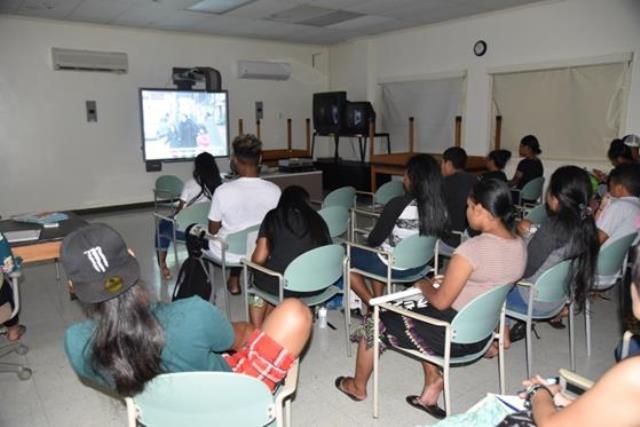 The students of COM watching the program (1)