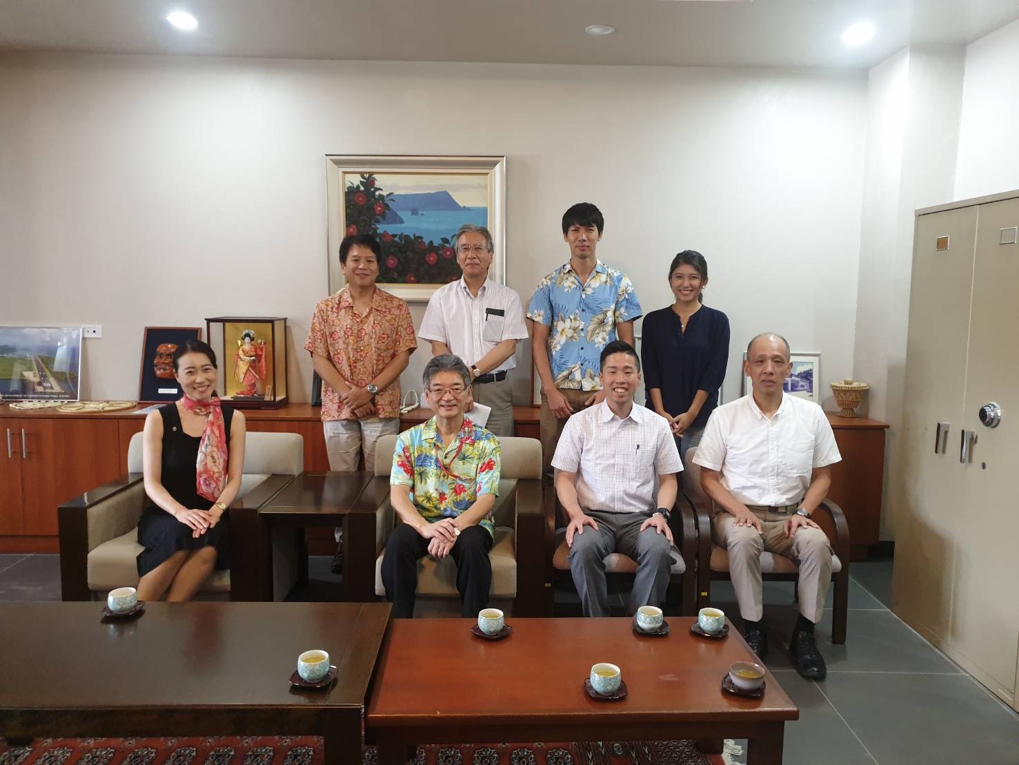 (Second row, from left) Counsellor Sugiyama, Mr. Shibata, JICA Resident Representative, Mr. Maki, Ms. Iizuka (First row, from left)Volunteer Ms. Itazu, Ambassador Sobashima, Volunteer Mr. Egashima, Voulnteer Mr. Takahashi