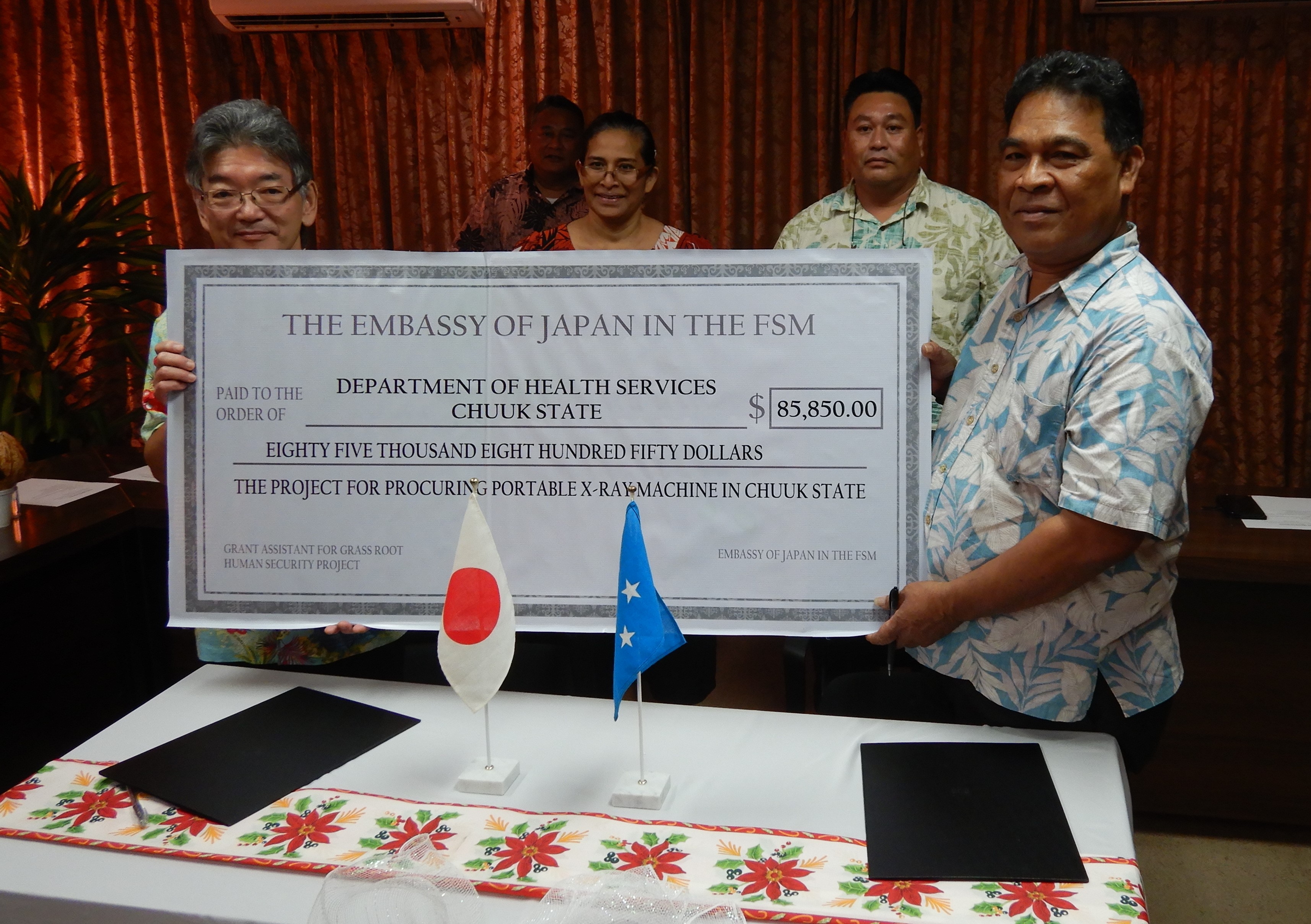 Handing over the big check